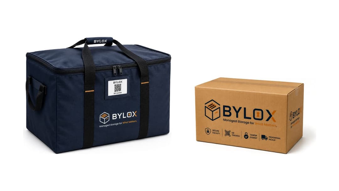 The Bylox Bag, a navy zip-up bag with a QR label, beside the smaller Bylox Box, a branded cardboard box